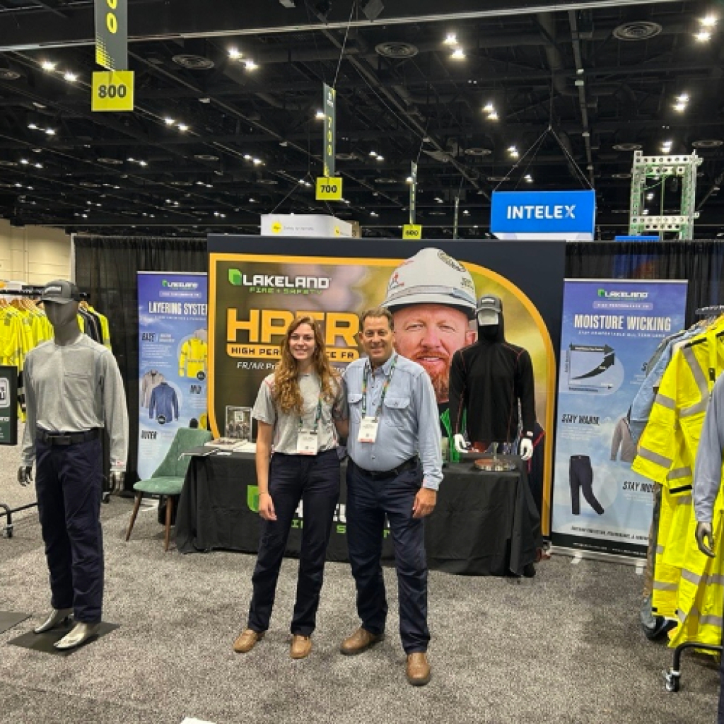 Trade show booth with workwear display products.