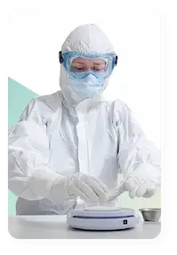 cleanroom worker in a critical environment wearing lakeland industries cleanmax to protect the environment from contaminations