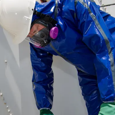 Chemical worker being protected by Pyrolon CBFR in Dark Blue